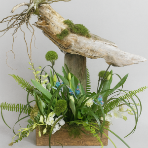 Corbeille avec branches et plantes l’original